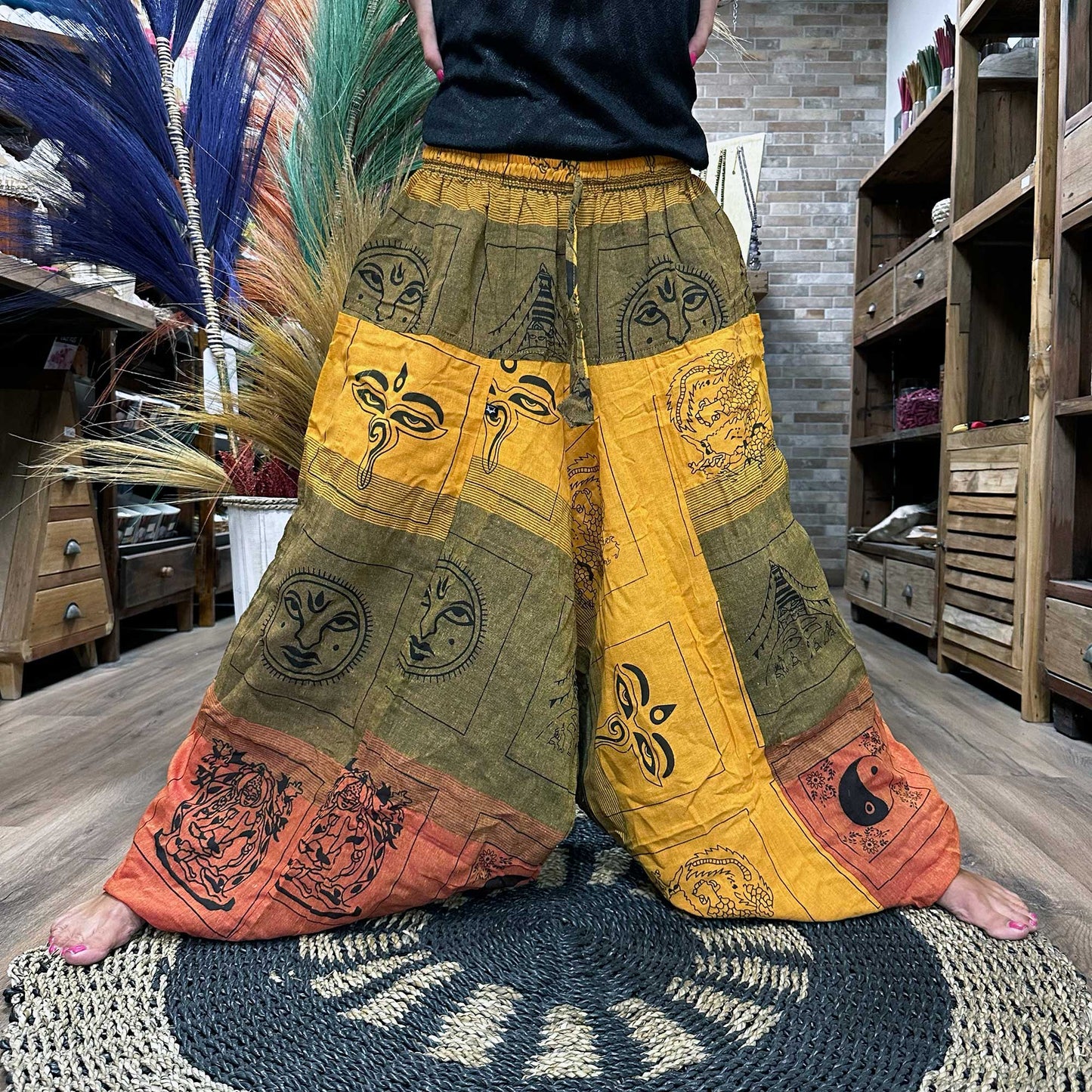 Samsara Wellbeing Aladdin style yoga pants with colourful patchwork design and elastic waistband