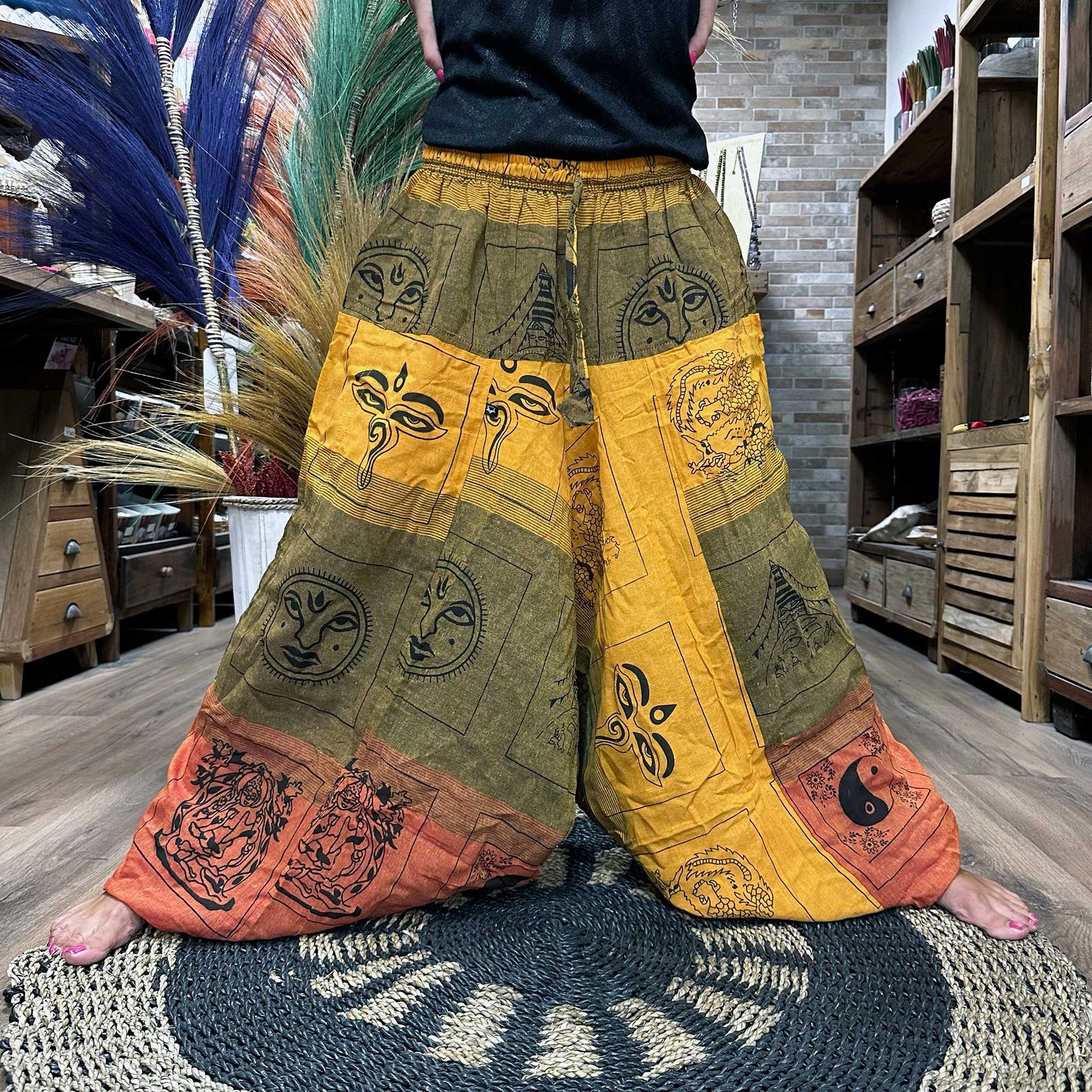 Samsara Wellbeing Aladdin style yoga pants with colourful patchwork design and elastic waistband