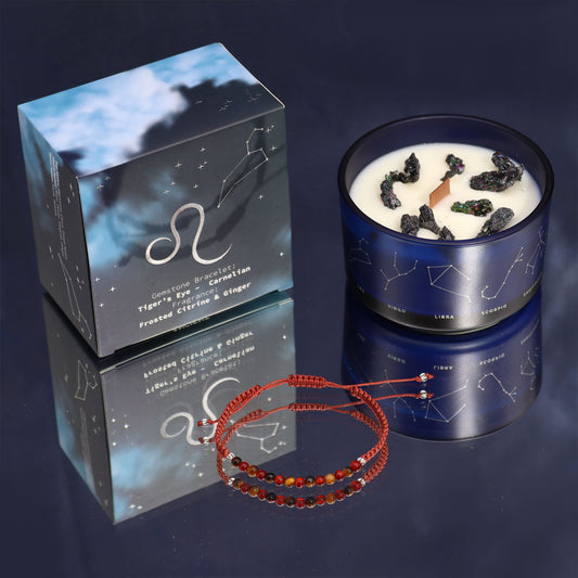 Samsara Wellbeing Leo zodiac crystal candle in blue holder with constellation design and red beaded bracelet