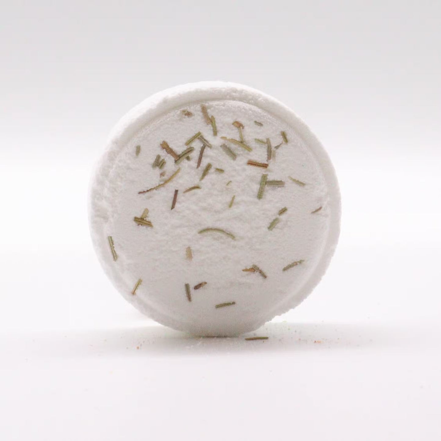 Samsara Wellbeing zen shower steamers white round bath tablet with dried herb pieces