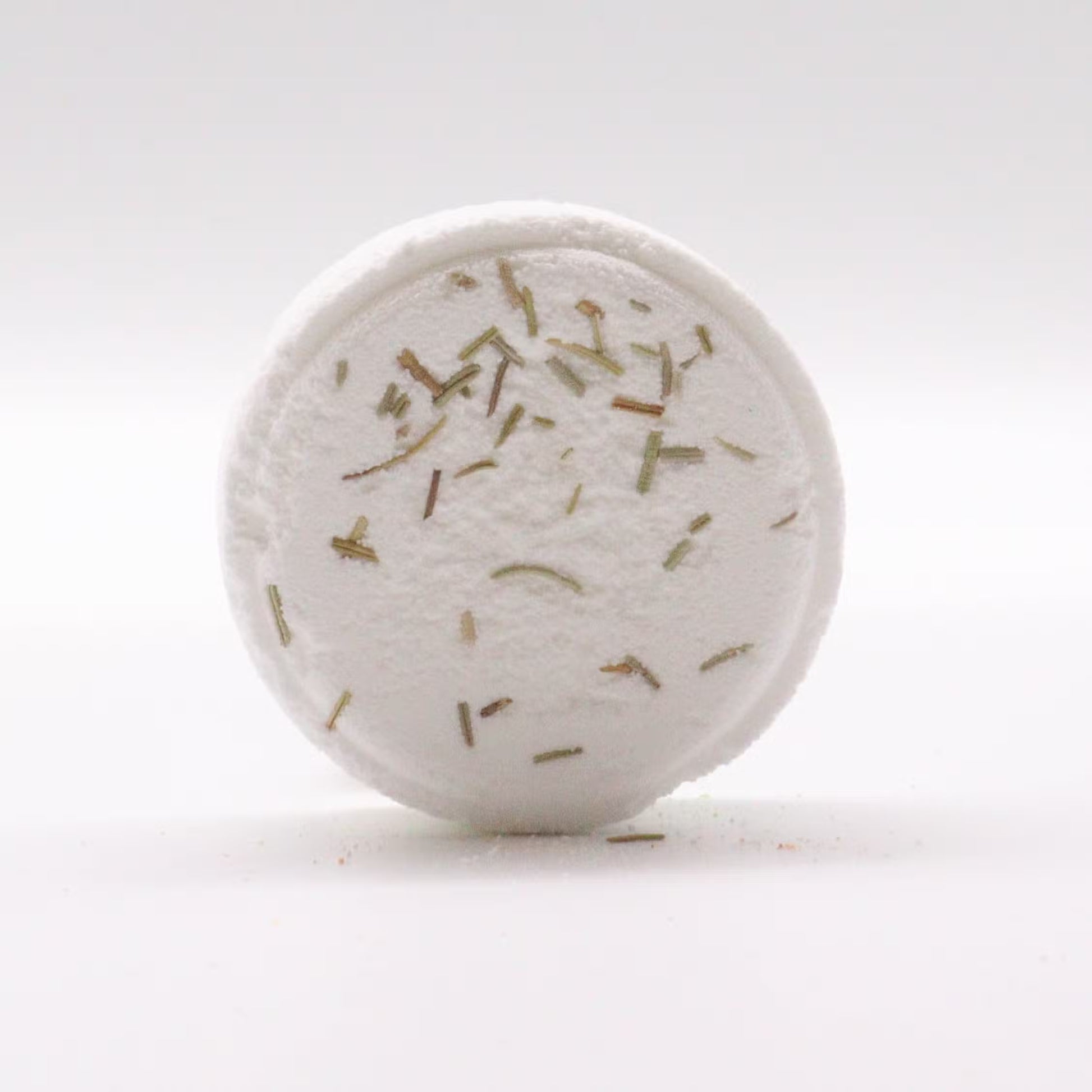 Samsara Wellbeing zen shower steamers white round bath tablet with dried herb pieces