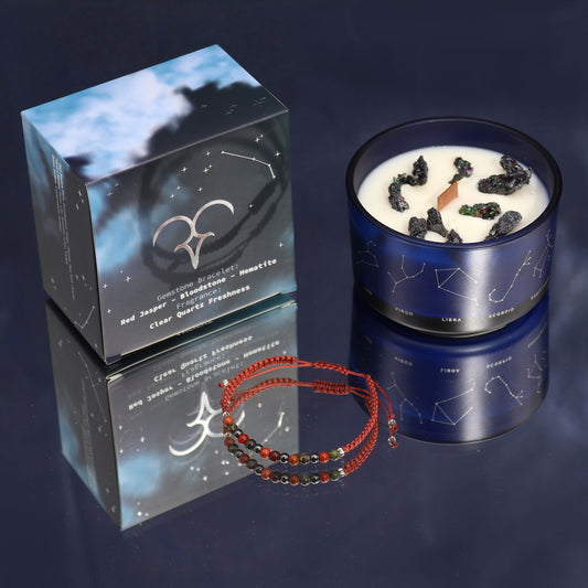 Aries zodiac crystal candle by Samsara Wellbeing with constellation design and gemstone bracelet