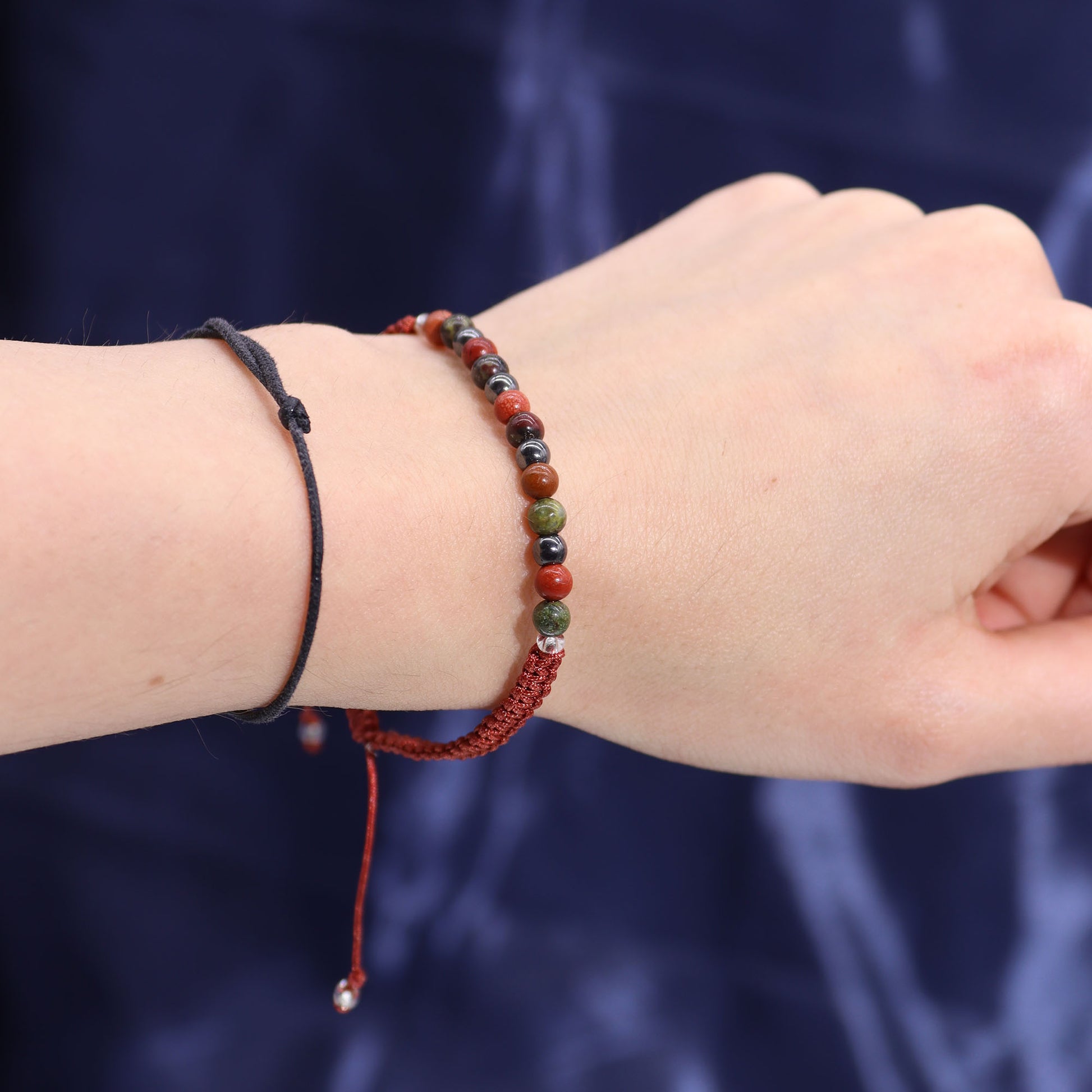 Samsara Wellbeing Aries zodiac crystal candle bracelet with multicolour beads on wrist