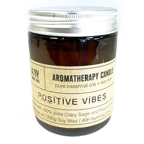 My Store soy wax candle with essential oils in brown glass jar with silver lid and positive vibes label