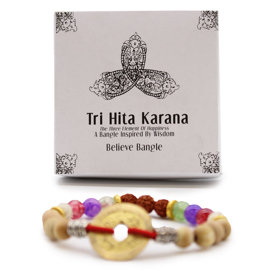 Tri Hita Karana bangle with multicolored beads and a circular gold charm by My Store