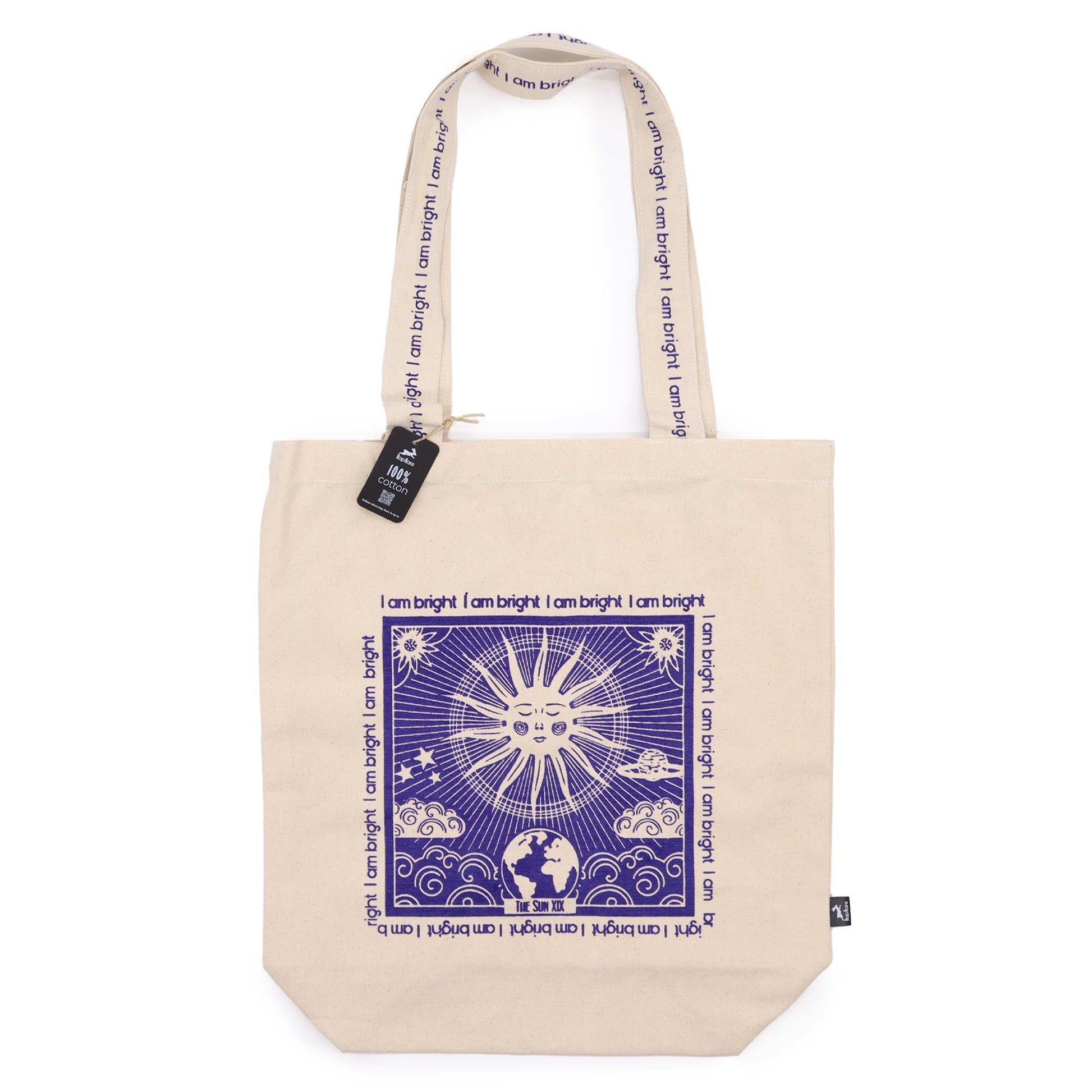 Beige cotton tote bag with print featuring sun and earth graphic and I am bright text design