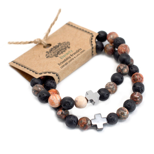 Gemstone friendship bracelets with black and brown beads and silver cross charms packaged with a rustic tag