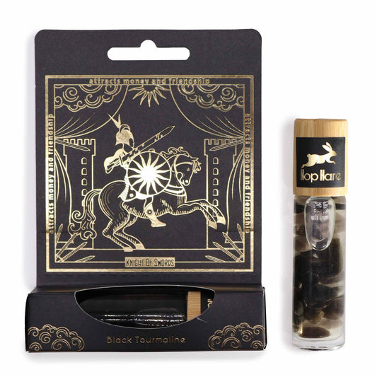 Tarot essential oil roll on with black tourmaline stones and Knight of Swords packaging design