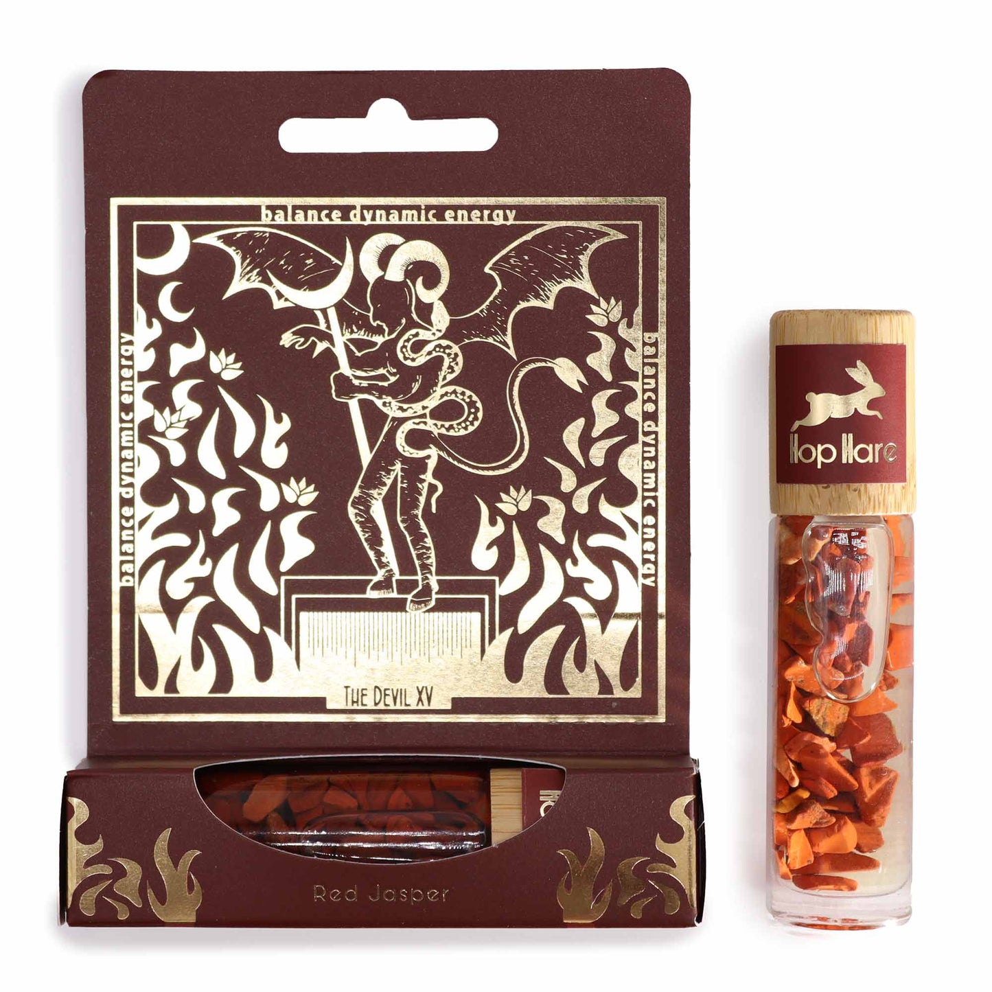 Tarot essential oil roller with red jasper stones and The Devil XV card design packaging