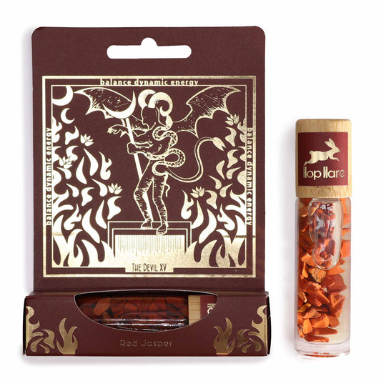 Tarot essential oil roller with red jasper stones and The Devil XV card design packaging