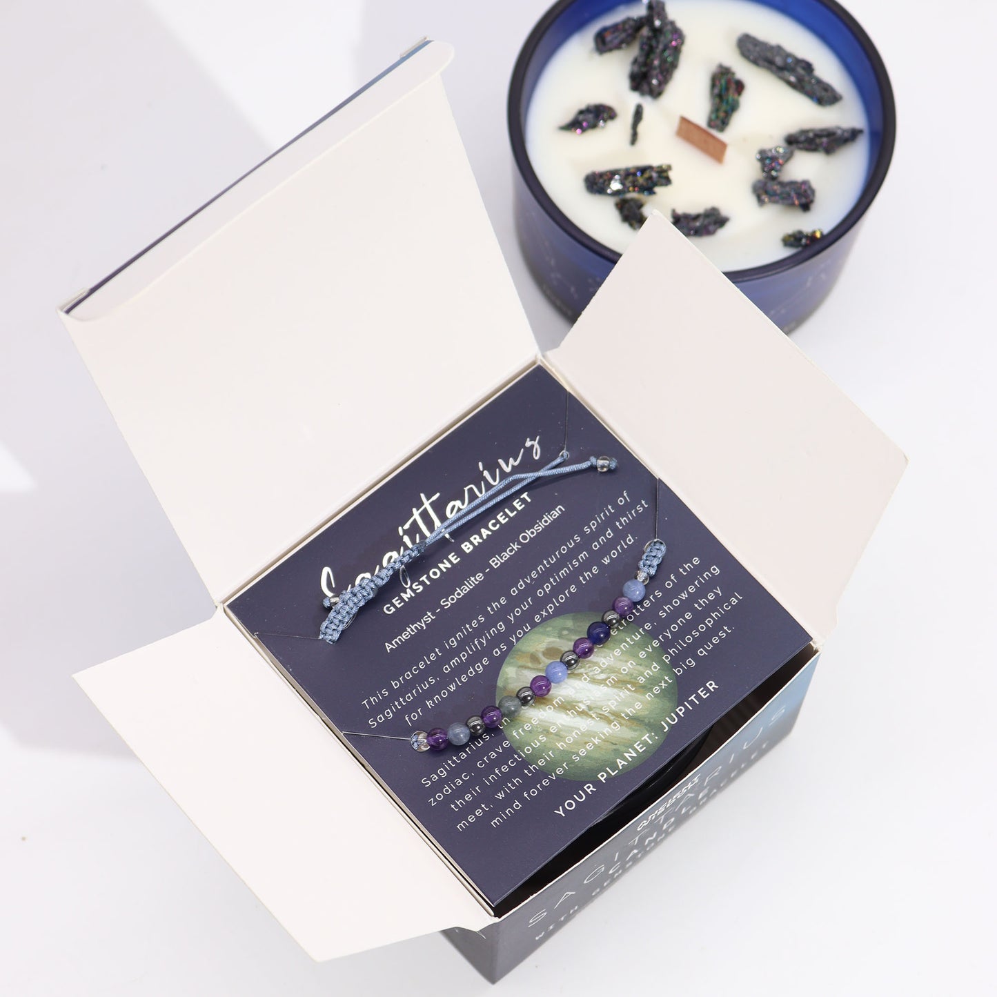 Samsara Wellbeing Sagittarius zodiac crystal candle with amethyst gemstone bracelet in open packaging