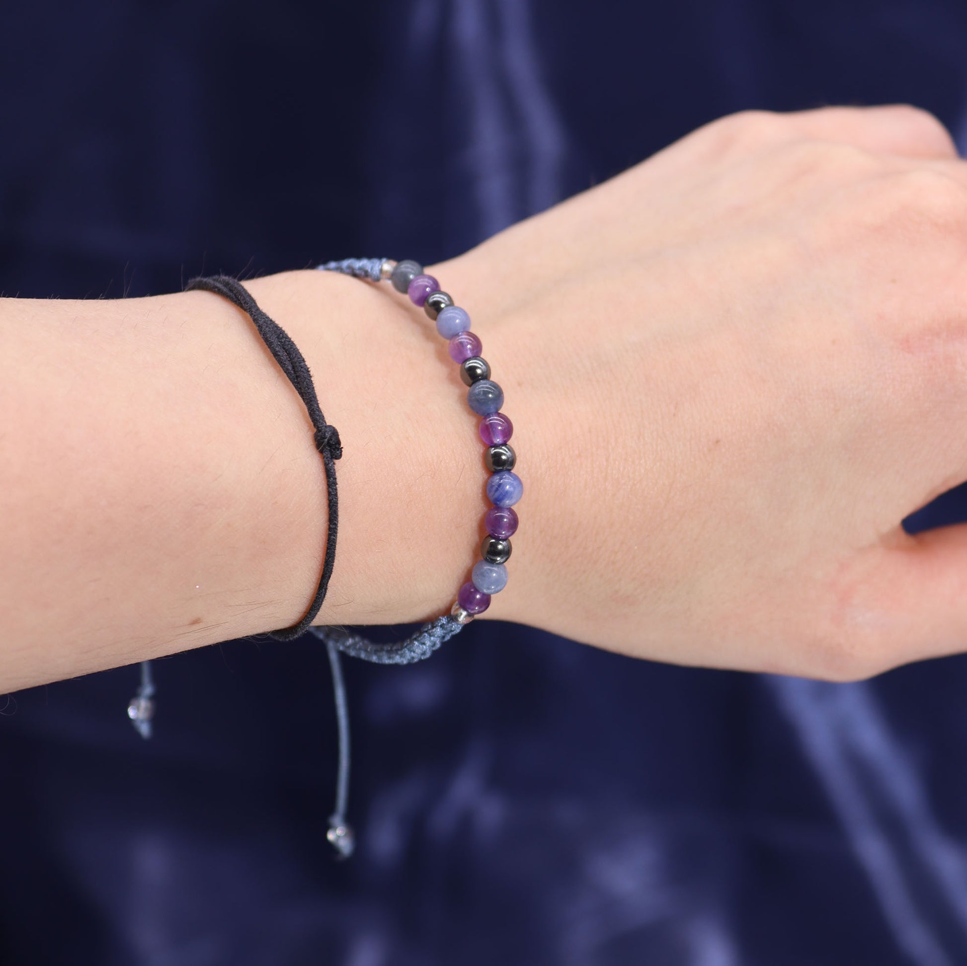 Sagittarius zodiac crystal candle bracelet with multicoloured beads on wrist by Samsara Wellbeing
