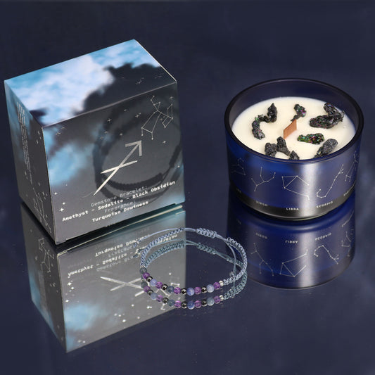 Sagittarius zodiac crystal candle by Samsara Wellbeing with constellation design and gemstone bracelet