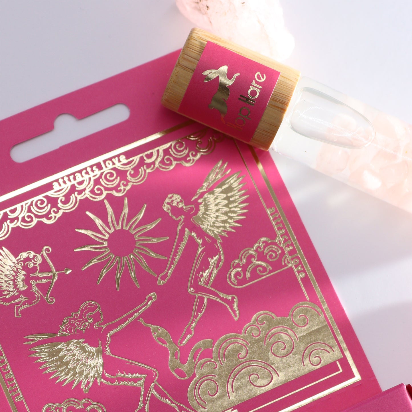 The lovers aromatherapy roller with pink and gold angelic packaging for essential oils