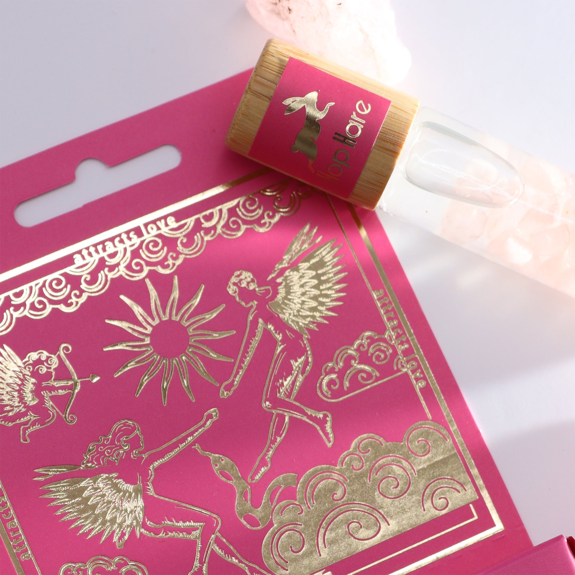 The lovers aromatherapy roller with pink and gold angelic packaging for essential oils