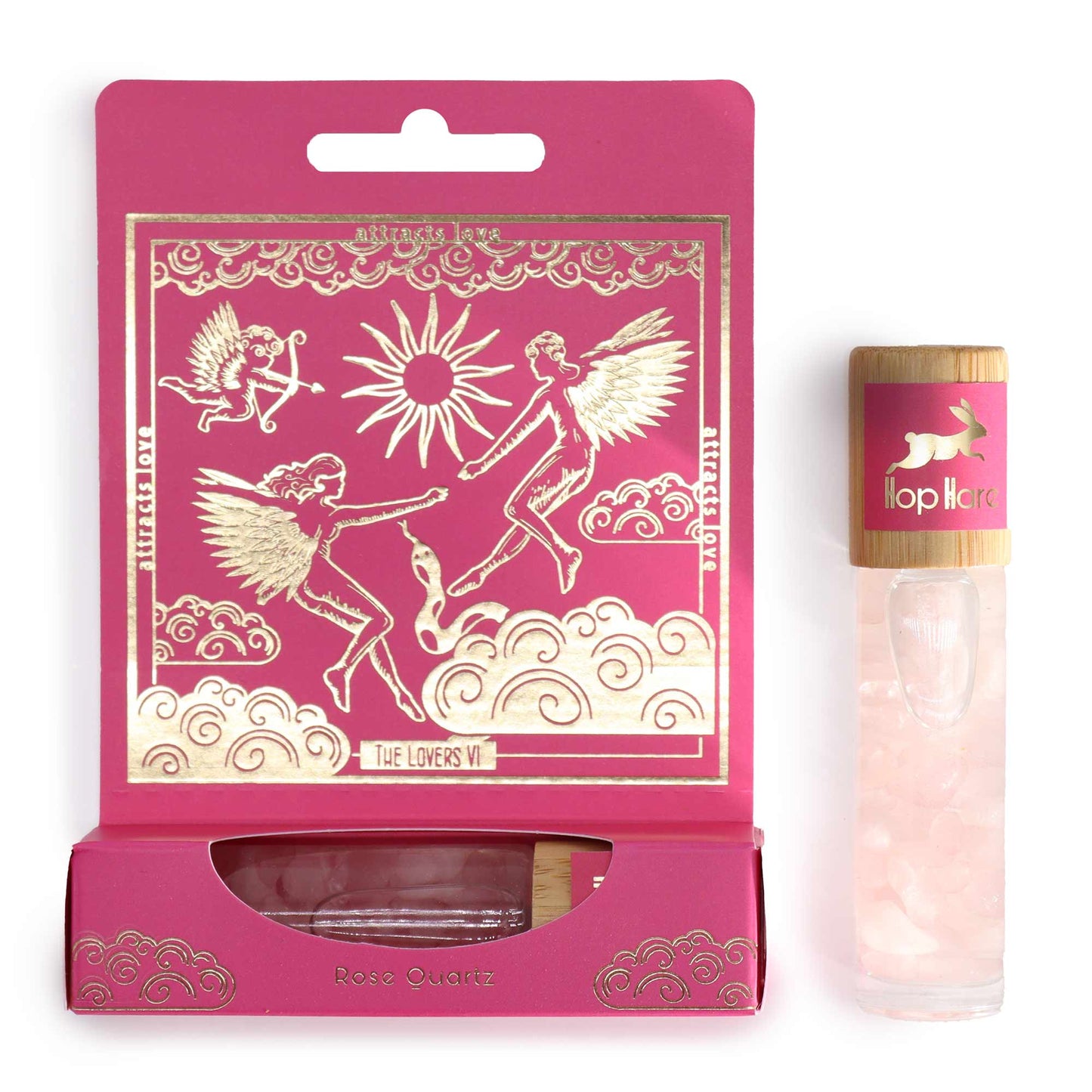 The lovers aromatherapy roller with rose quartz in a pink decorative box featuring angelic illustrations