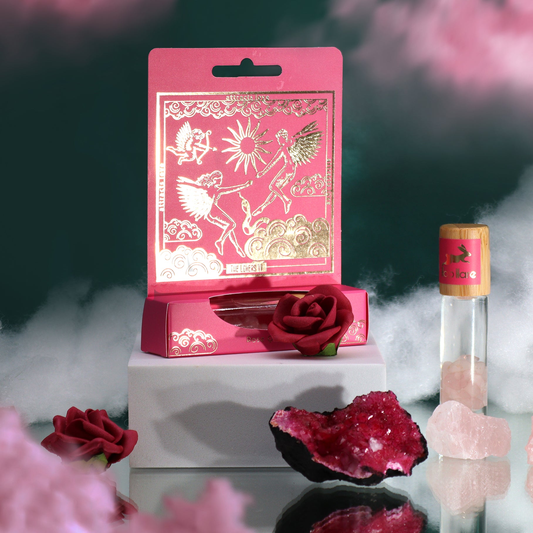 The lovers aromatherapy roller essential oil displayed with decorative pink box and rose for aromatherapy benefits
