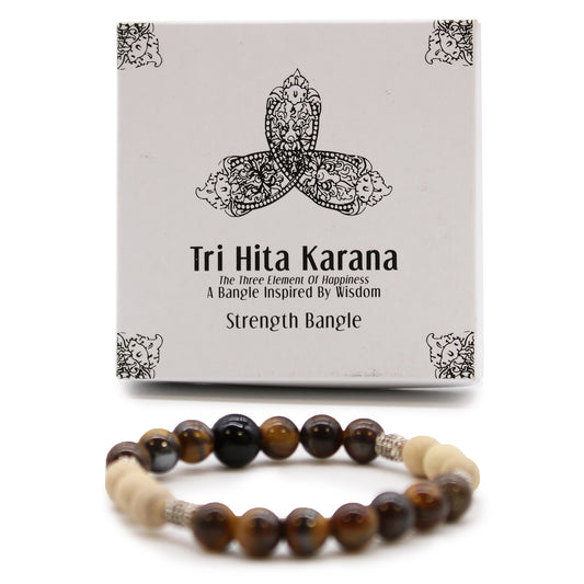 Tri Hita Karana bracelet with brown and cream beads displayed with branded packaging from My Store